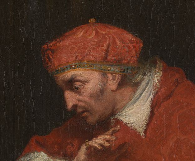 Painting. Detail view of a pale-skinned man’s face as he looks down, the eye we can see wide under a raised brow. This is Thomas Wolsey, and he wears a red, high crowned cap and red robes.
